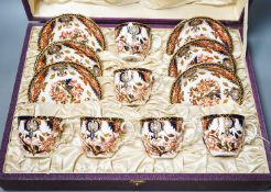 A cased Crown Derby Imari pattern coffee service