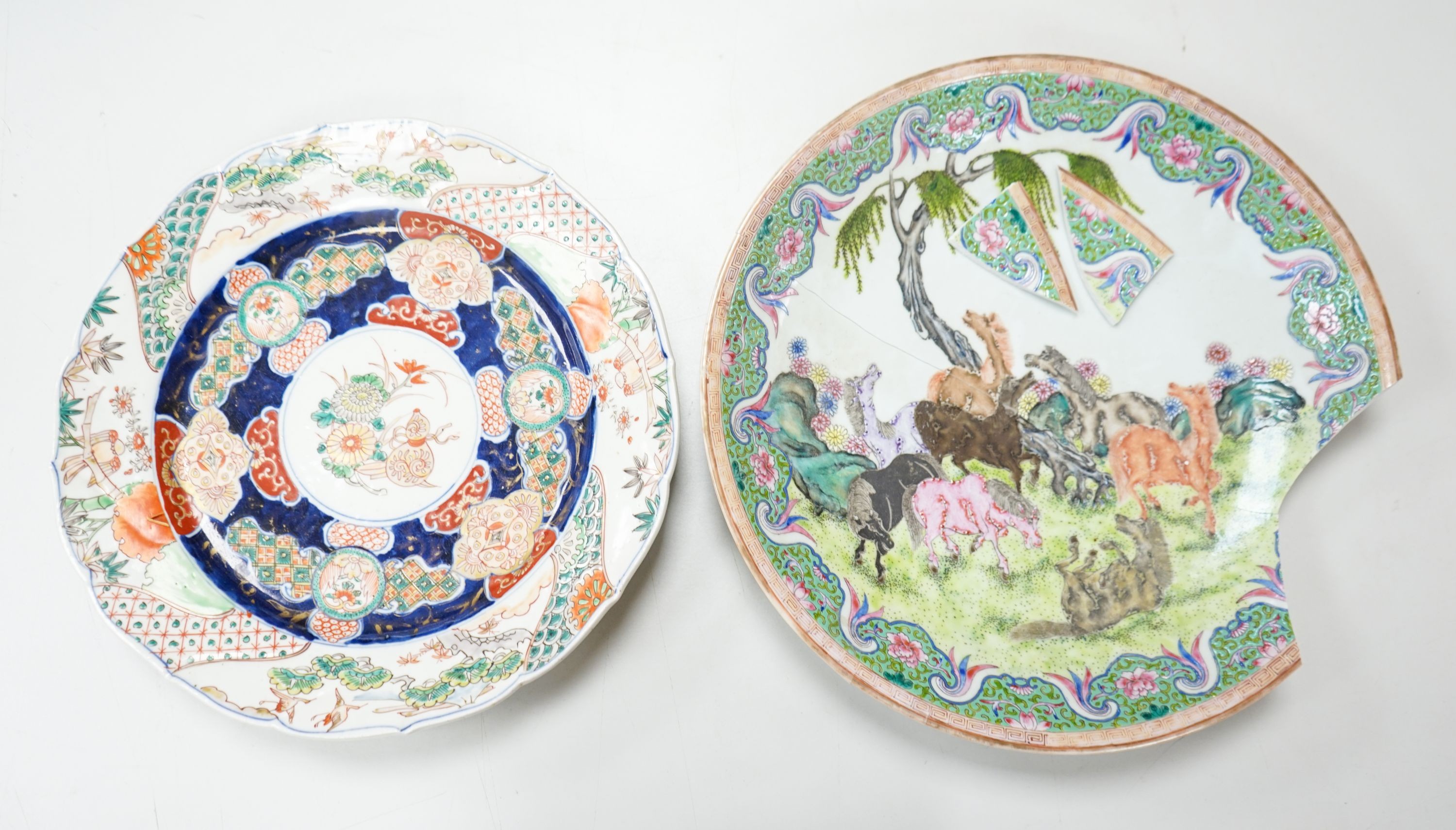 A 19th century Japanese Imari dish, 30cm and a damaged Chinese famille rose dish, 33.5cm34cm