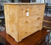 A Victorian stripped pine chest of drawers (lacking feet), width 95cm, depth 53cm, height 74cm