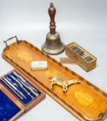 A Victorian bronze school bell, a tray and sundry items