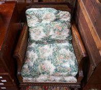 A 1920's mahogany single caned bergere armchair, width 75cm, depth 80cm, height 80cm