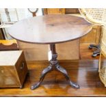 A George III carved mahogany circular birdcage tilt top tripod tea table, diameter 77cm, height