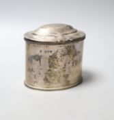 A late Victorian silver oval tea caddy, with gadrooned borders and hinged cover, Charles Stuart