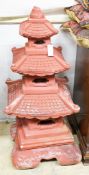 A painted reconstituted stone sectional pagoda garden ornament, height 104cm