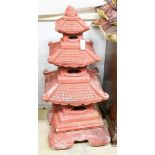 A painted reconstituted stone sectional pagoda garden ornament, height 104cm