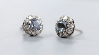 A pair of white metal aquamarine and diamond cluster set ear studs, 10mm, gross weight 3.5 grams.