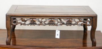 A Chinese carved hongmu low occasional table, width 76cm, depth 41cm, height 27cm