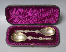 A cased pair of Victorian silver apostle spoons, Charles Boyton II, London, 1884, 20cm, 6oz.