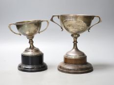 Two early to mid 20th century silver two handled presentation trophy cups, tallest 14cm (a.f.),gross