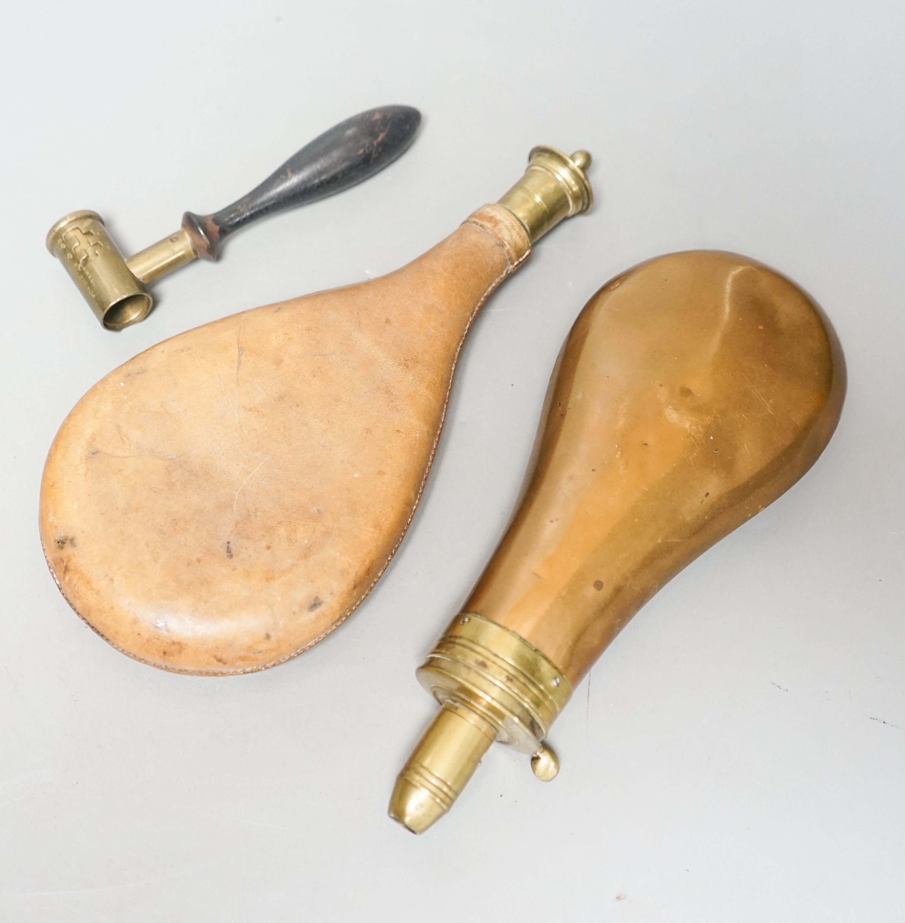 Two 19th century shot flasks and a powder measure - Image 2 of 2