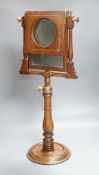 A George III inlaid mahogany zograscope,62cm