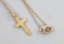 An Edwardian yellow meta cross pendant with engraved inscription, 29mm, on a yellow metal (stamped