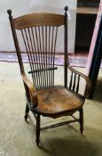 An early 20th century American ash and oak elbow chair, width 52cm, depth 42cm, height 100cm