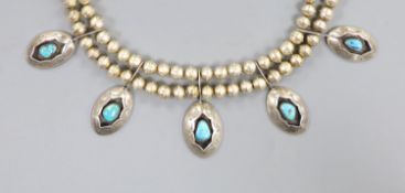 A 20th century South American? white metal and turquoise set drop necklace, approx. 44cm, gross