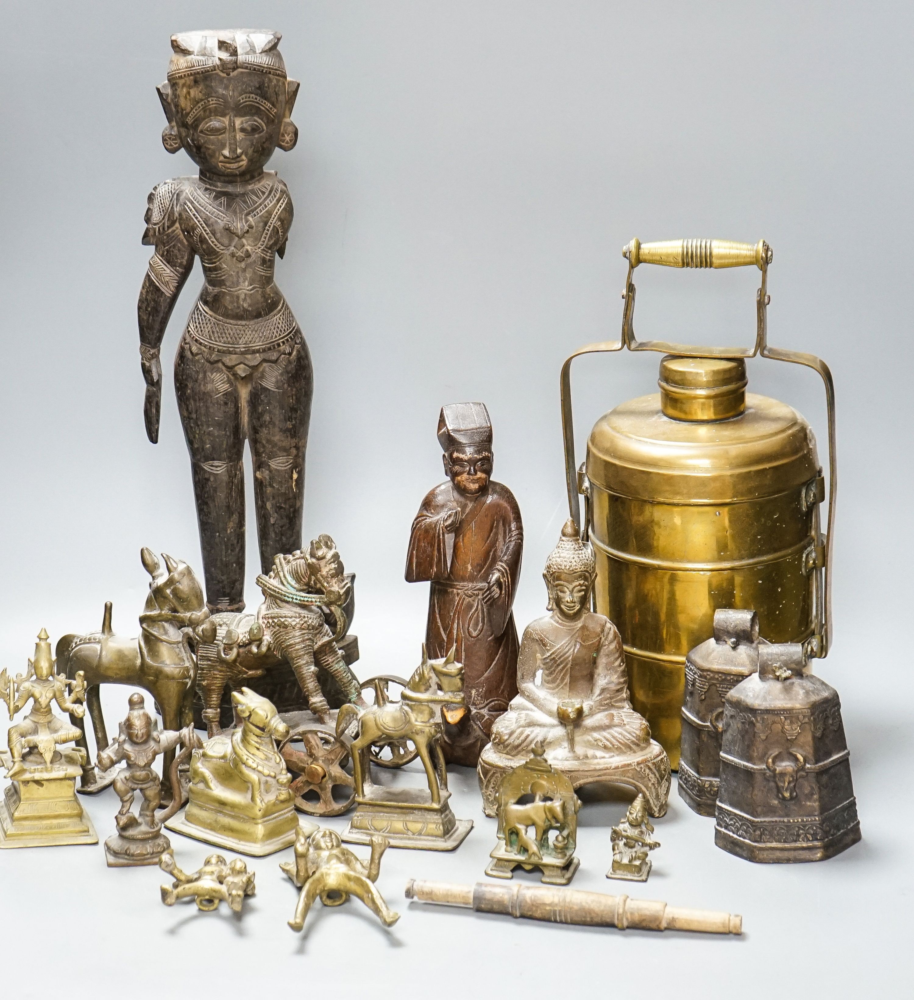 A group of Indian brass and wood figures and a Chinese wood figure