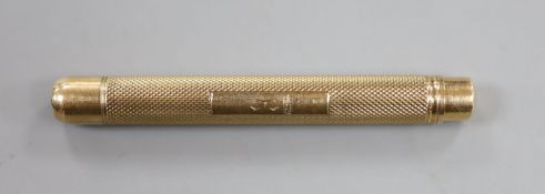 A 1950's engine turned 9ct gold pencil, maker, EB, London, 1956, 78mm, gross 19.2 grams.