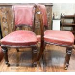 A set of six Victorian leather and mahogany dining chairs