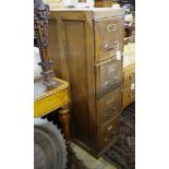 An early 20th century oak four drawer filing cabinet, width 37cm, depth 70cm, height 130cm