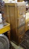 An early 20th century oak four drawer filing cabinet, width 37cm, depth 70cm, height 130cm