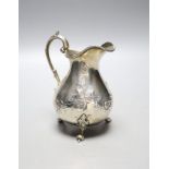A Victorian silver baluster cream jug, London, 1860, height 13.8cm, 6oz.
