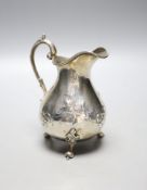 A Victorian silver baluster cream jug, London, 1860, height 13.8cm, 6oz.