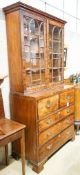 An early 19th century inlaid mahogany secretaire bookcase, length 103cm, depth 53cm, height 221cm