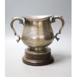 An Edwardian silver two handled presentation trophy cup, with later engraved inscription relating to