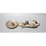 A silver and ivory baby's rattle with teething ring and a Mexican sterling 'hat' snuffer and three