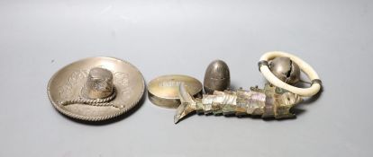 A silver and ivory baby's rattle with teething ring and a Mexican sterling 'hat' snuffer and three