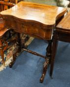 A Victorian rosewood serpentine games / work table with parquetry inlaid interior, width 55cm, depth