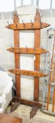 A late Victorian pitch pine hall stand, width 96cm, height 212cm