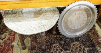 An Indian brass tray top table on folding stand, diameter 74cm, height 56cm together with a circular