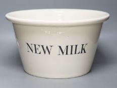 A large 'New Milk' creamware dairy bowl by Dairy Supply Co. Limited, Museum Street, London39cm
