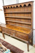 A Victorian oak dresser, width 182cm, depth 51cm, height 206cm