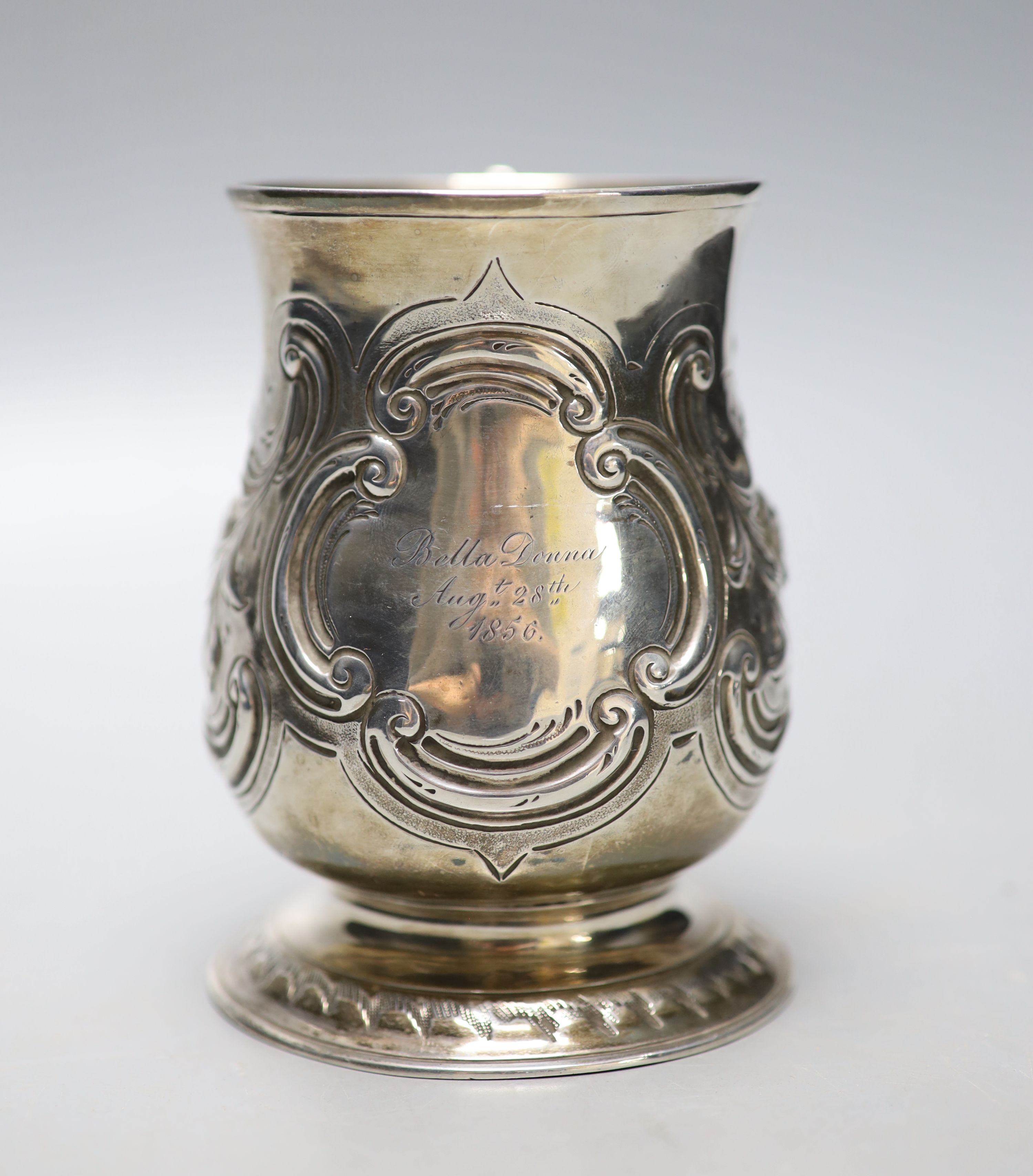 A George III silver baluster mug, with later embossed decoration and later engraved inscription, - Image 2 of 3