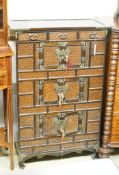 A 20th century Chinese stained wood and rattan side cabinet, width 67cm, depth 32cm, height 104cm