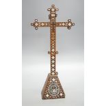 A 19th century Continental fruitwood crucifix with mother of pearl inlay, H 36cm