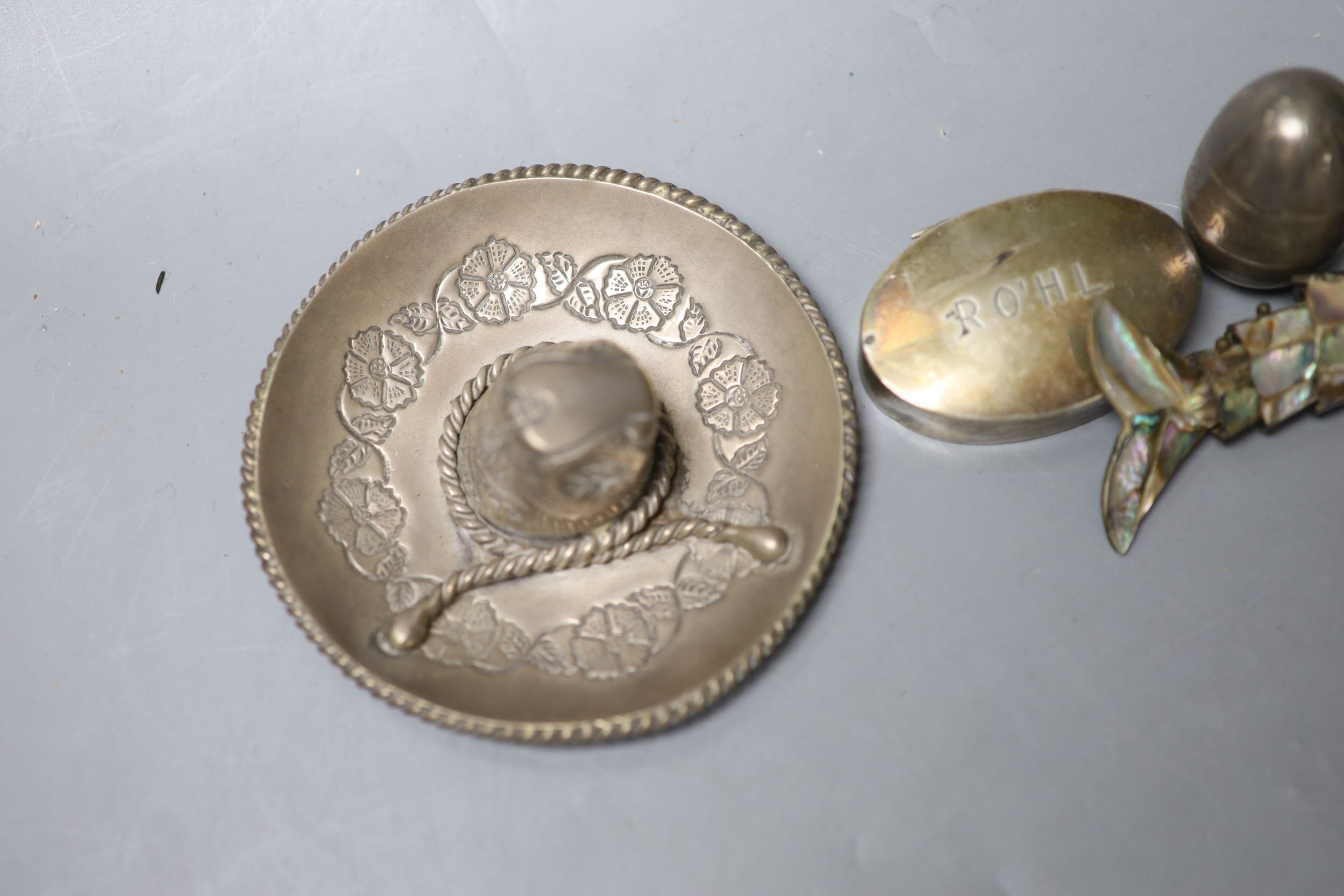 A silver and ivory baby's rattle with teething ring and a Mexican sterling 'hat' snuffer and three - Image 2 of 3