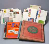 Three albums of World stamps, mostly used and various losse stamps