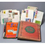 Three albums of World stamps, mostly used and various losse stamps