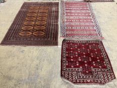 A Bokhara orange ground rug 198 x 125 cms, a smaller Anatolian flat weave rug and Bokhara prayer