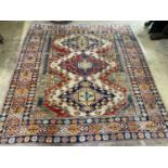 A Caucasian design carpet, 200 x 220cm