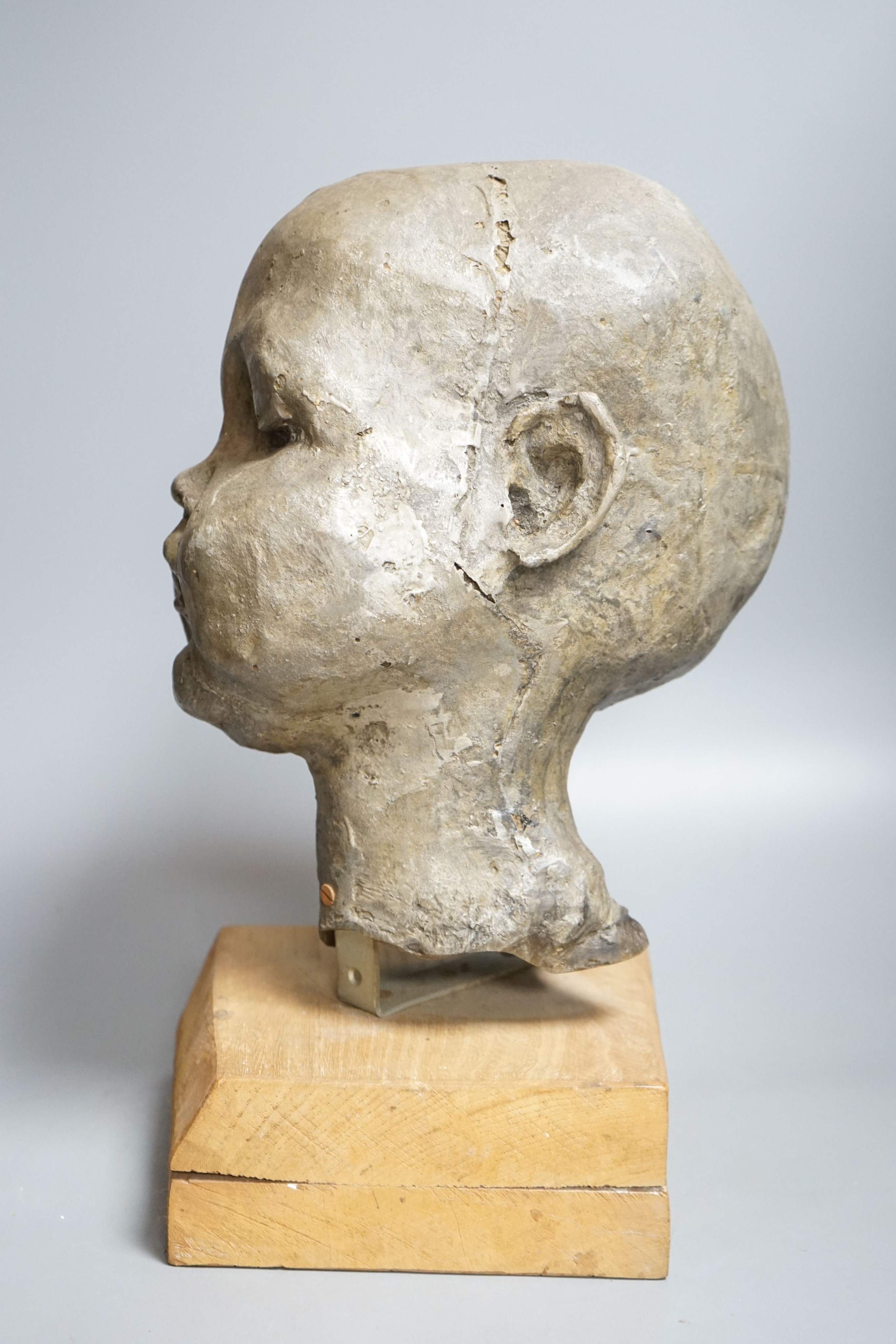A composition sculpture of a child’s head40 cm high including plinth - Image 2 of 2