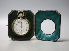 A George V engine turned silver mounted travelling watch case, with nickel cased 8 day pocket watch,