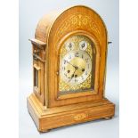 A German rosewood and marquetry chiming mantel clock, early 20th century,45cm