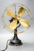 A vintage electric oscillating fan