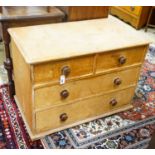 A Victorian stripped pine chest of drawers (lacking feet), width 94cm, depth 52cm, height 67cm
