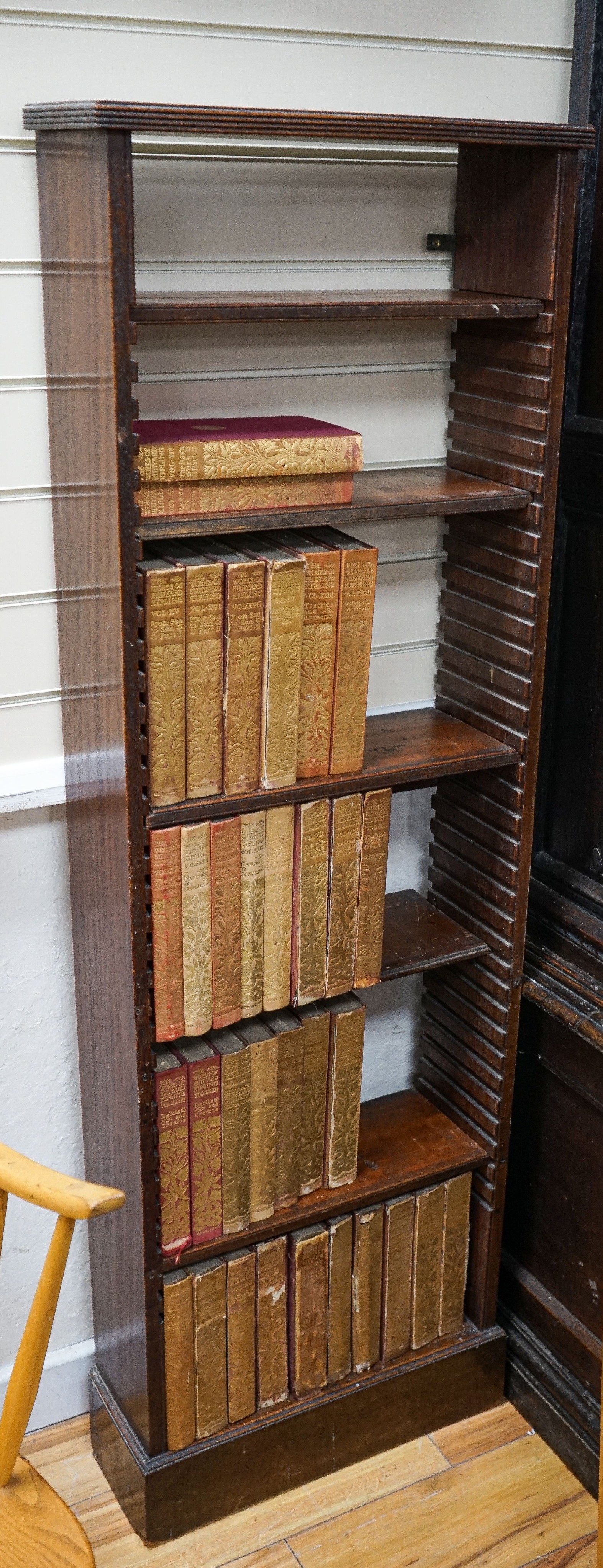 A Georgian mahogany wall-mounted narrow bookshelf, width 48cm, depth 18cm, height 147cm,