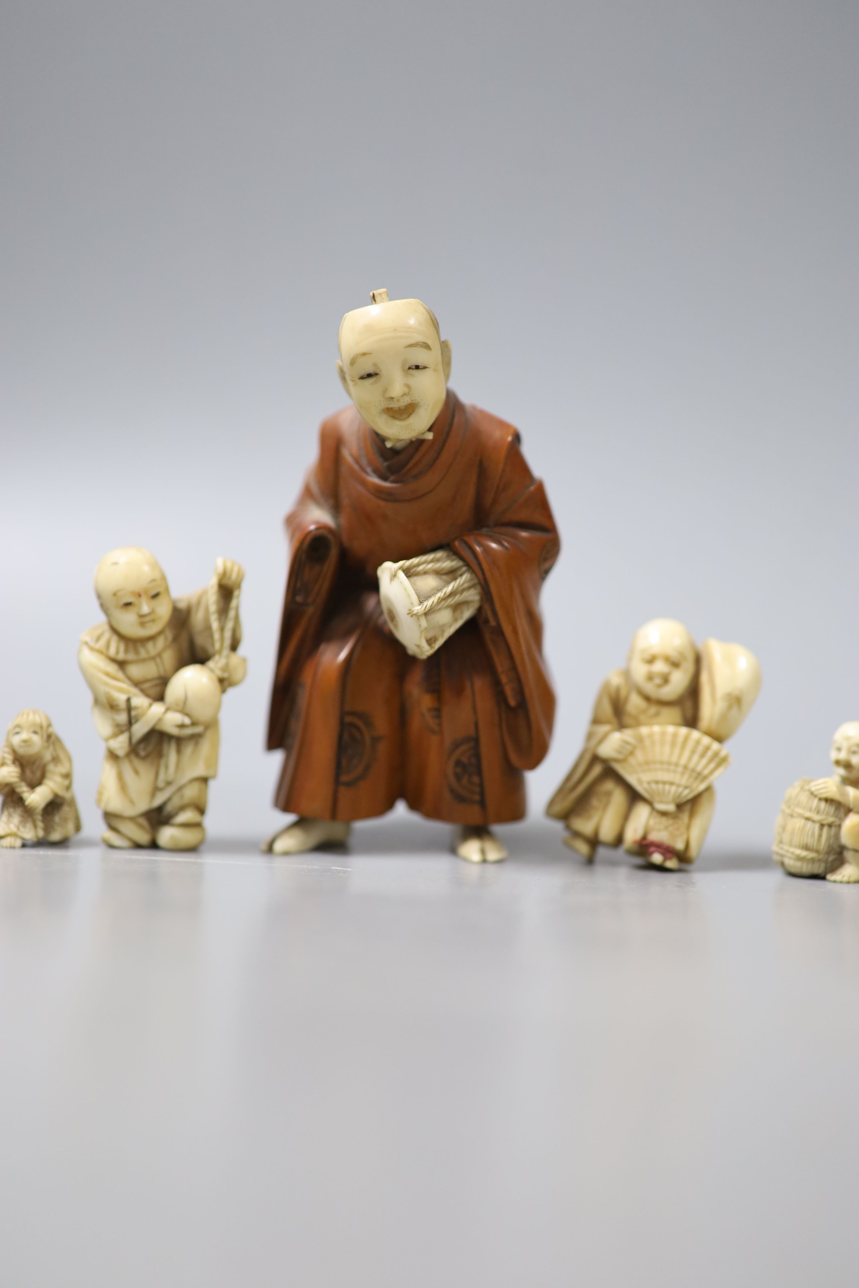 Three Japanese ivory netsuke, a similar okimono and a boxwood and ivory okimono, 9cm (losses) - Image 3 of 3