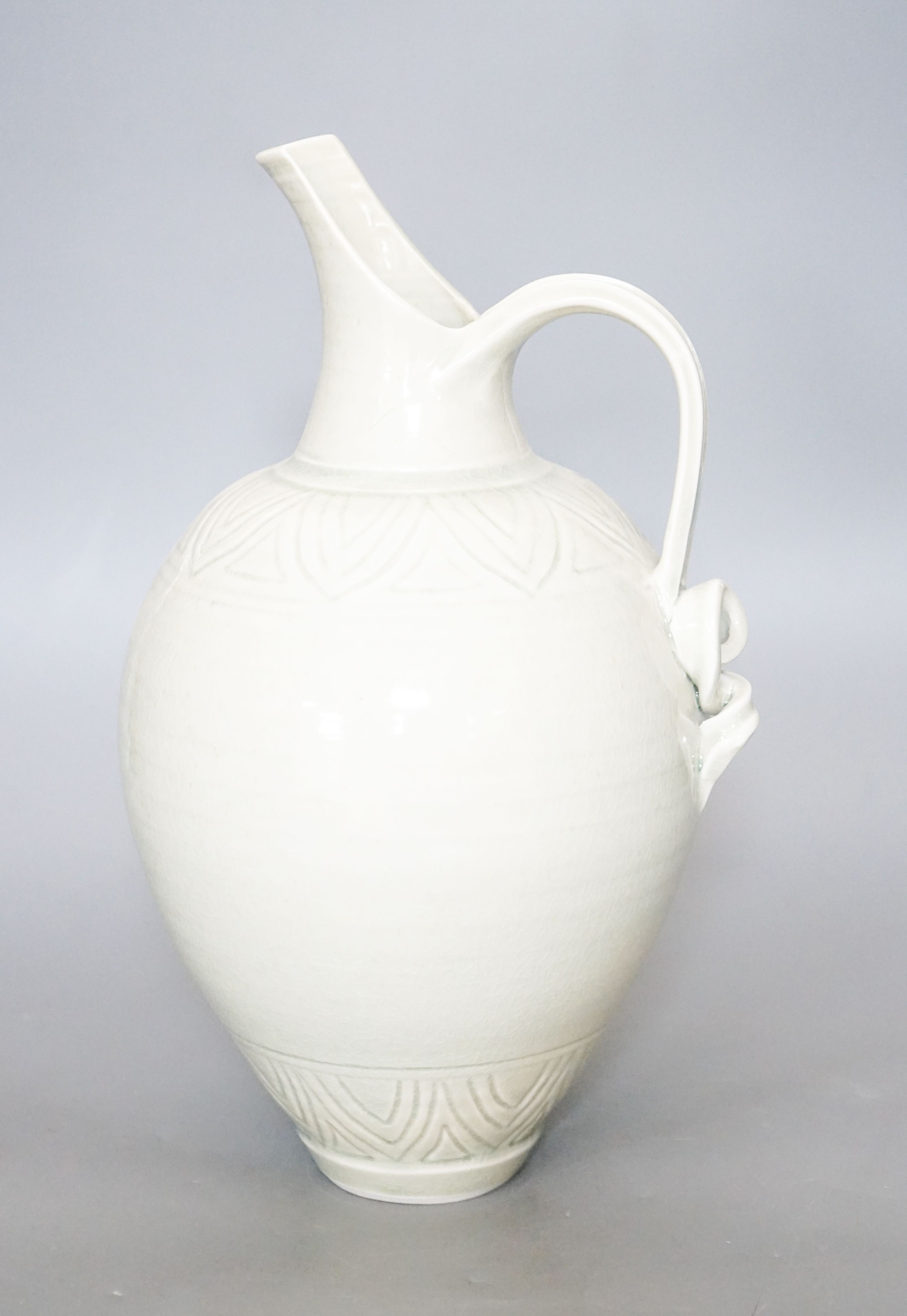 Bridget Drakeford (b.1946), a celadon glazed porcelain jug30cm